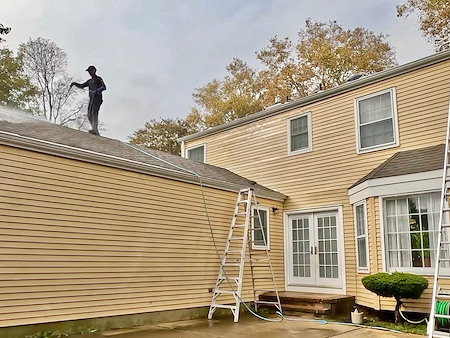 Soft washing asphalt shingle roof in Colts Neck, NJ
