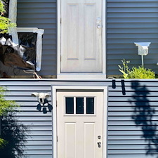 Tinton-Falls-NJ-Soft-Wash-Expertise-Restoring-Vinyl-Siding-White-Trim-and-Concrete-Walkways 10